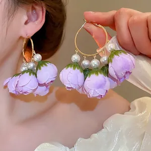 Floral tassel hoop earrings with purple flower buds and pearls for elegant women