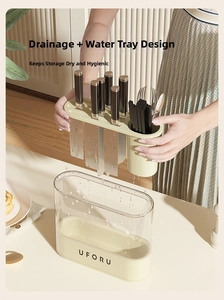 Close-up of the detachable dual-layer kitchen rack showing water draining functionality