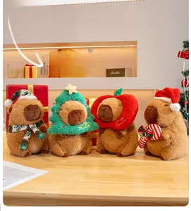 Detailed view of Christmas Capybara plushies with festive hats, scarves and tree outfits