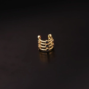 Ear cuff dorato multistrato con zirconi colorati e pietre verdi a forma di occhi di serpente