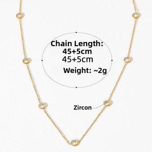 Detail of 45+5cm gold chain necklace with seven inlaid round cubic zirconia stones