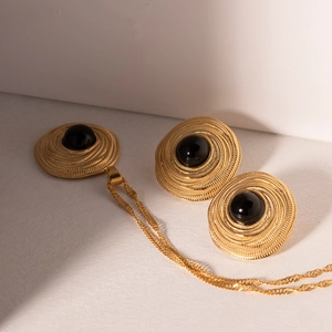 Retro golden coil earrings and necklace set with round black onyx inlays