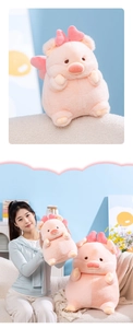 Detail of pink plush pig toy with bow and wings in a cozy home setting macro view