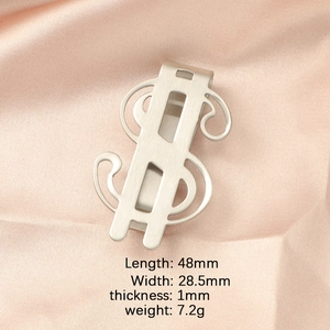 Detailed view of matte stainless steel dollar sign money clip with dimensional specs