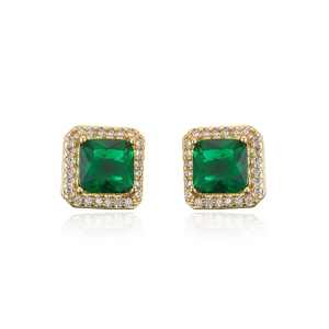 Detailed close-up of 18K gold earrings featuring green square zircon and clear crystals