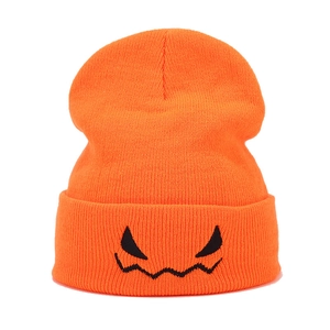 Orange Halloween knit beanie with black pumpkin monster embroidery for men and women
