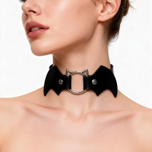Close-up of black PU leather punk choker featuring bat wings and silver cat ear ring