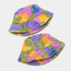 Close-up of the plush texture and camouflage pattern on the warm faux fur bucket hat