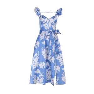 Detail of blue floral print dress featuring ruffled straps and side slit hemline