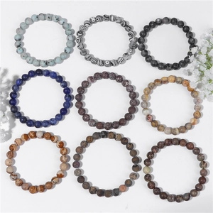 Detailed grid view of 8mm natural stone bead bracelets in various mineral colors and textures