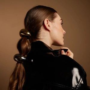 Set of gold and silver irregular metallic ponytail cuffs with high-gloss mirror finish