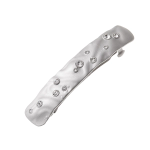 Irregular silver hair clip with sparkling rhinestones and a unique wavy metal texture