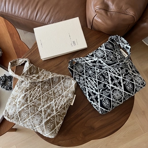 Vintage embroidered canvas mini tote bags in coffee and black with folk geometric patterns