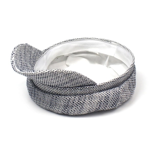 Close-up of internal white lining and size label for black and white woven cadet hat