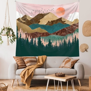 Detail of landscape tapestry featuring mountain silhouettes above a sofa in a living room