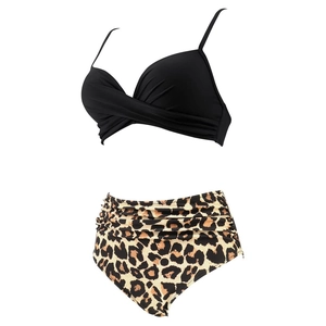 Detail of high waisted bikini set with black twist top and leopard print bottoms
