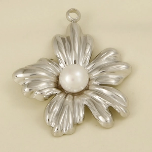 Macro view of 304 stainless steel flower pendant with a white natural pearl center