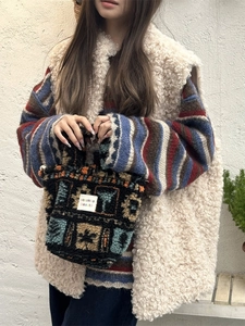 Ethnic style plush tote bag with colorful geometric patterns and soft fuzzy texture