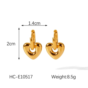Size details of 18K gold heart earrings showing 1.4cm width and 2cm height dimensions