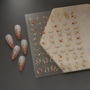 Stickers à ongles dorés style français avec cristaux et motifs de lignes géométriques