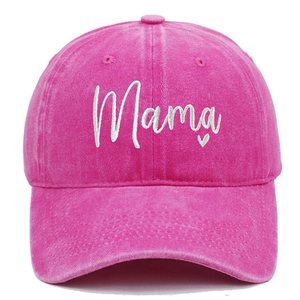 Close-up of Mama embroidery and heart on a pink washed cotton baseball cap texture
