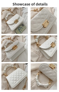 Detail showing white quilted texture, golden hardware lock and gathered handle of the bag