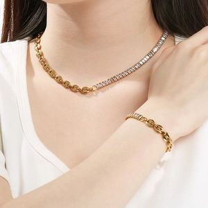 Gold OT buckle necklace and bracelet set featuring a half-chain and diamond splice design