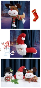 Detailed plush reindeer curtain tieback with festive red and green scarf for Xmas decor