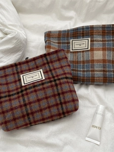 Vintage plaid wool toiletry bag and makeup pouch with red and blue checkered patterns