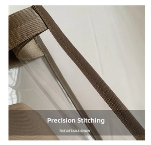 Close-up of durable nylon strap stitched onto transparent PVC material of the bag