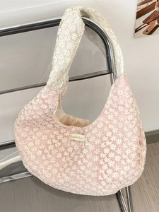Pink lace mesh hobo bag with white daisy embroidery and Soraloka brand label