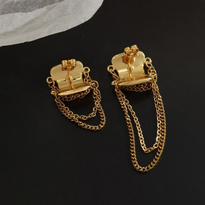 Elegant gold-plated brass tassel earrings featuring a unique hat-shaped stud design