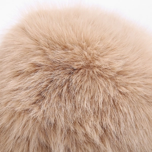 Close-up showing the soft plush texture and thick fluffy faux fur of the bucket hat