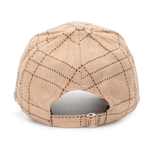 Detail view of khaki plaid baseball cap featuring an adjustable silver metal buckle strap