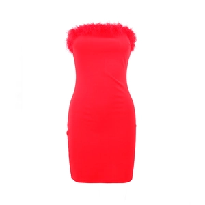 Detail of red tube bodycon dress featuring elegant feather trim along the neckline