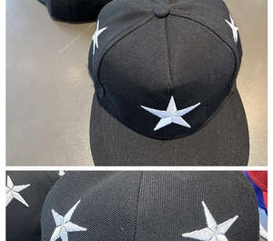 Détail de la broderie d'étoiles blanches sur une casquette de baseball noire classique