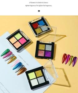 Detail of four-color solid aurora nail powder palettes and metallic chrome press-on nails