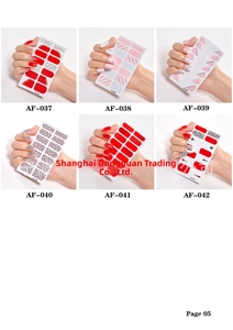 Detail view of 6 nail sticker sets featuring red gold foil and geometric patterns