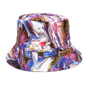 Detailed close-up of vibrant tie-dye bucket hat with marble pattern and stitching