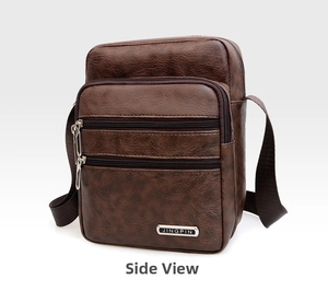 Detail view of dark brown textured leather business messenger bag with triple zip pockets