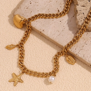 Elegant 18K gold-plated stainless steel necklace with seashell and starfish charms