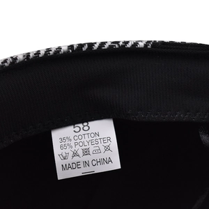 Classic plaid newsboy hat lining with cotton-poly fabric and size label details