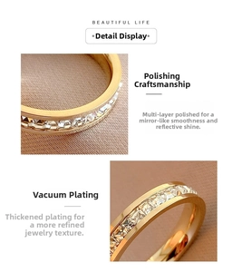 Detailed macro view of gold plated titanium steel ring with sparkling row of cubic zirconia