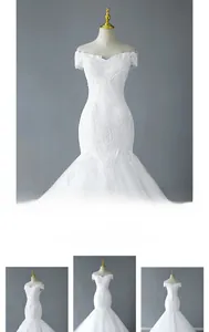 Detail view of white lace wedding dress featuring beaded embroidery and mermaid tail design