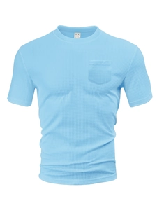 Detailed macro view of sky blue waffle knit fabric texture on men's short sleeve T-shirt