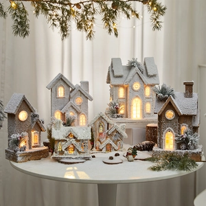 Lighted wooden Christmas snow house decorations with LED lights for festive holiday decor