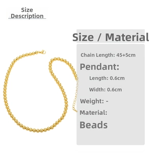 Detail view of 0.6cm gold bead necklace with 45+5cm adjustable chain and polished finish