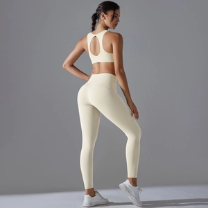 Creamy beige yoga set with hollow back sports bra and high waist leggings for women
