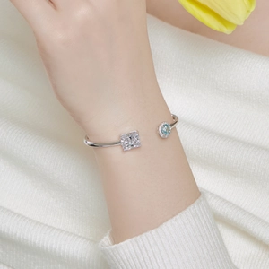 Detailed close-up of S925 sterling silver spring bangle with ice-cut zircon on wrist