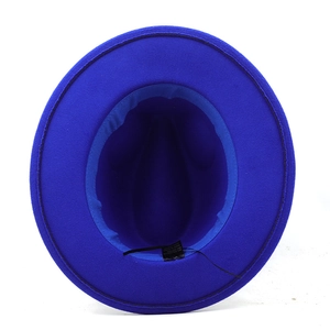 Top view of royal blue fedora hat interior with sweatband and washing label